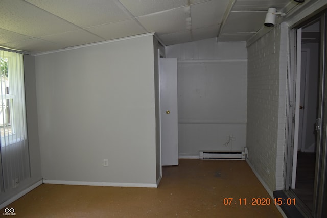 9016 Neptune Dr, Indianapolis, IN 46229 - empty room with a baseboard heating unit and a drop ceiling