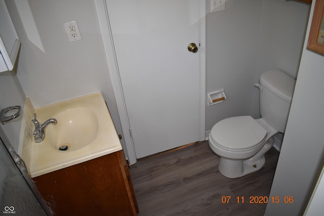9016 Neptune Dr, Indianapolis, IN 46229 - half bath featuring vanity and wood finished floors