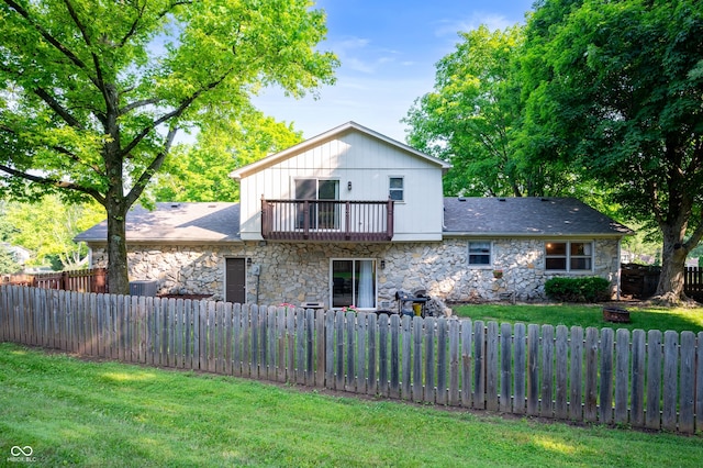 1031 Lancashire Ln, Pendleton, IN 46064 - rear view of house with stone siding and a balcony