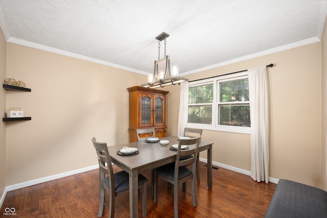 1031 Lancashire Ln, Pendleton, IN 46064 - dining room with dark wood-type flooring, ornamental molding, and a chandelier
