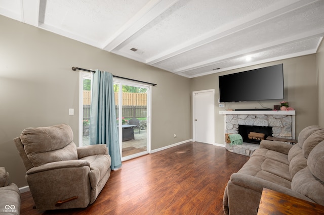 1031 Lancashire Ln, Pendleton, IN 46064 - living room with dark wood-type flooring, beam ceiling, and a fireplace