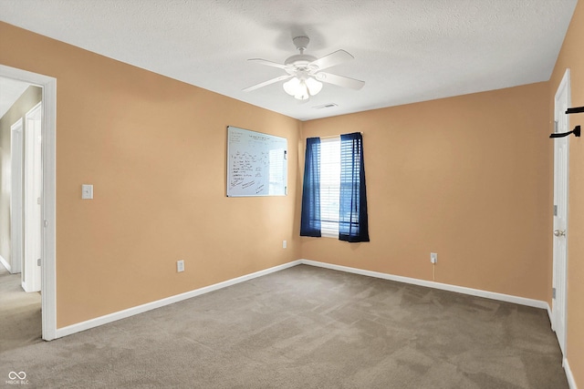 12322 Cool Winds Way W, Fishers, IN 46037 - carpeted empty room with ceiling fan and a textured ceiling