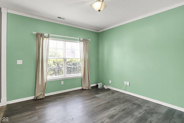 12322 Cool Winds Way W, Fishers, IN 46037 - spare room featuring ornamental molding and dark wood-type flooring