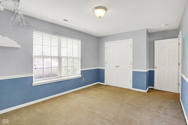 12322 Cool Winds Way W, Fishers, IN 46037 - unfurnished bedroom with carpet floors and a closet