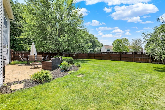 12322 Cool Winds Way W, Fishers, IN 46037 - fenced backyard featuring a patio area