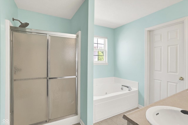 12322 Cool Winds Way W, Fishers, IN 46037 - full bath with a shower stall, a jetted tub, vanity, and tile patterned floors