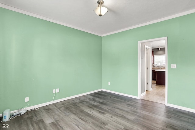 12322 Cool Winds Way W, Fishers, IN 46037 - empty room with crown molding and dark wood-style flooring