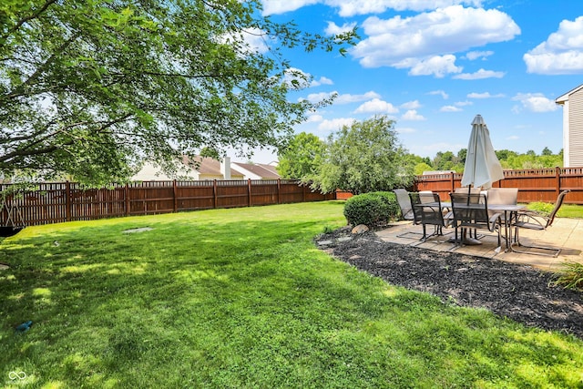 12322 Cool Winds Way W, Fishers, IN 46037 - fenced backyard featuring a patio area