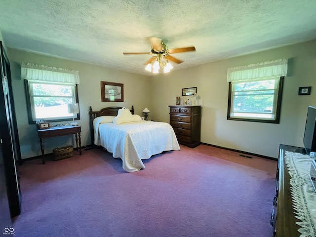 1008 Whispering Trl, Greenfield, IN 46140 - carpeted bedroom featuring a textured ceiling and ceiling fan