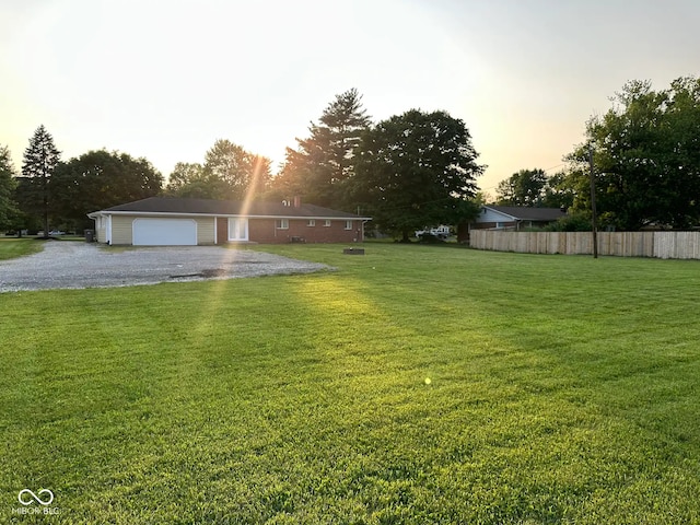 2951 S Elizabeth St, Indianapolis, IN 46203 - view of yard featuring a garage