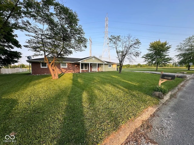 2951 S Elizabeth St, Indianapolis, IN 46203 - single story home with brick siding and a porch