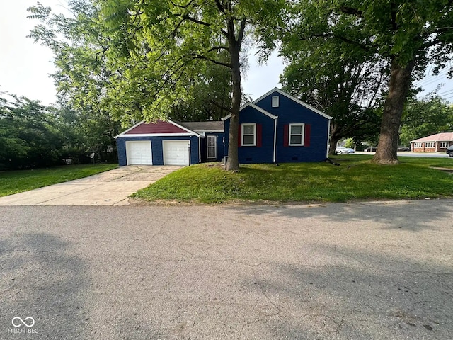 5704 N Keystone Ave, Indianapolis, IN 46220 - view of front of property with driveway, a garage, a front lawn, and crawl space