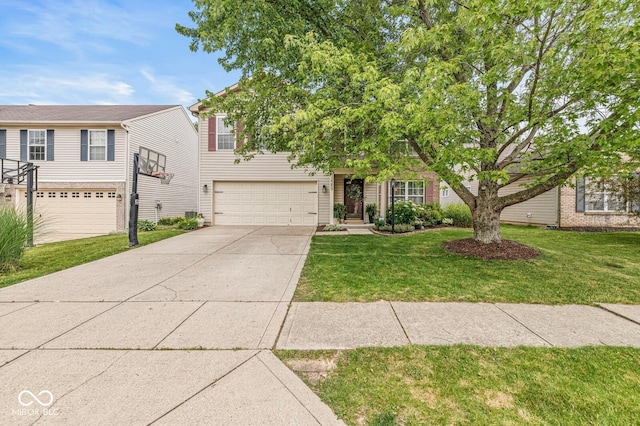 12259 Sweet Creek Trl, Fishers, IN 46037 - view of property hidden behind natural elements with driveway, an attached garage, and a front lawn