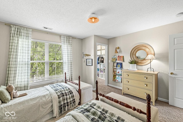 12259 Sweet Creek Trl, Fishers, IN 46037 - carpeted bedroom with a textured ceiling