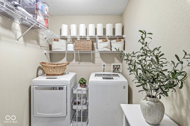 12259 Sweet Creek Trl, Fishers, IN 46037 - washroom with separate washer and dryer and a textured wall
