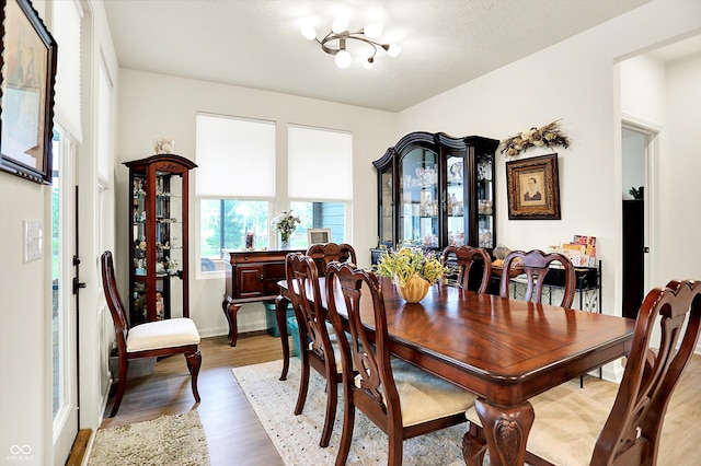 2612 Ruffian Dr, Westfield, IN 46074 - dining room with wood finished floors and a chandelier