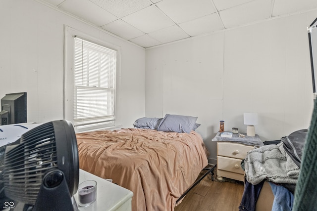 1849 E Minnesota St, Indianapolis, IN 46203 - bedroom featuring wood finished floors and a paneled ceiling
