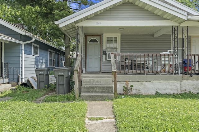 1849 E Minnesota St, Indianapolis, IN 46203 - view of front of home featuring covered porch