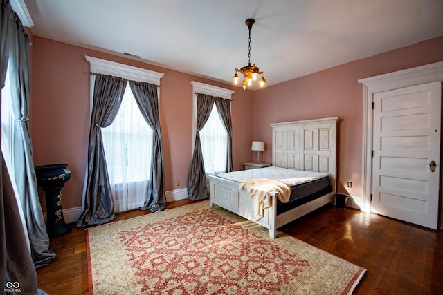 825 E Washington St, Muncie, IN 47305 - bedroom featuring dark wood finished floors