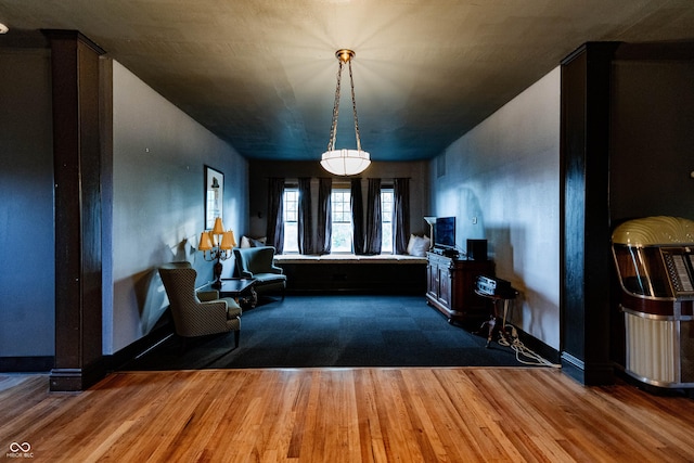 825 E Washington St, Muncie, IN 47305 - living area with wood finished floors and baseboards