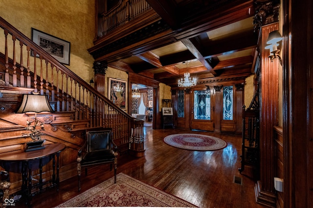 825 E Washington St, Muncie, IN 47305 - entryway with a chandelier, hardwood / wood-style floors, stairs, beam ceiling, and coffered ceiling