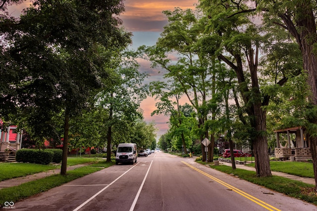 825 E Washington St, Muncie, IN 47305 - view of asphalt road with sidewalks and traffic signs