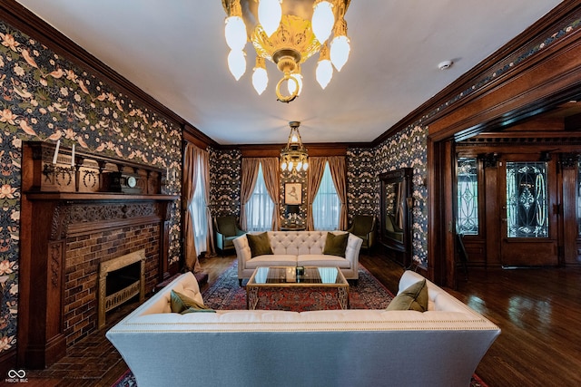 825 E Washington St, Muncie, IN 47305 - living area with a chandelier, wood finished floors, ornamental molding, wallpapered walls, and a fireplace