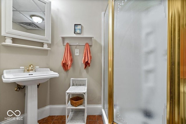 6975 Milhouse Rd, Indianapolis, IN 46221 - bathroom with a stall shower and tile patterned flooring