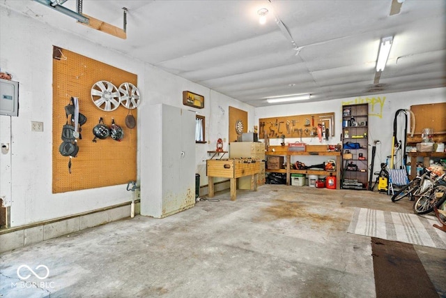 6975 Milhouse Rd, Indianapolis, IN 46221 - garage featuring a workshop area