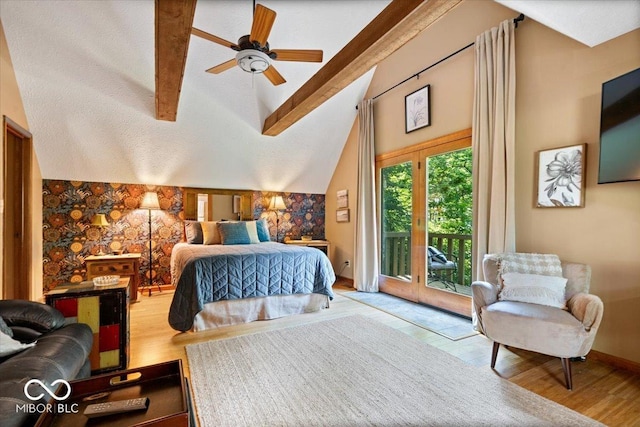 6975 Milhouse Rd, Indianapolis, IN 46221 - bedroom with access to exterior and wood finished floors