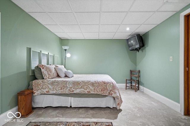 6975 Milhouse Rd, Indianapolis, IN 46221 - bedroom featuring a paneled ceiling and baseboards