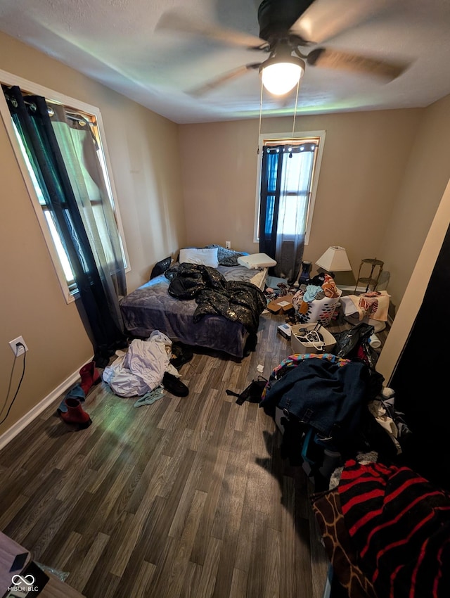 1609 Brown St, Anderson, IN 46016 - bedroom with wood finished floors and a ceiling fan
