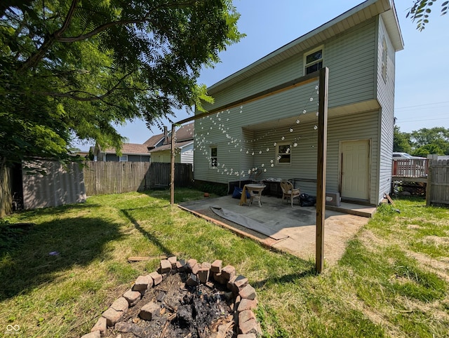 1609 Brown St, Anderson, IN 46016 - rear view of property featuring a patio area and a fenced backyard