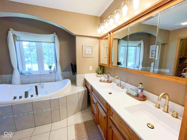 14266 S 125 E, Clinton, IN 47842 - full bathroom with plenty of natural light, double vanity, tile patterned floors, and a bath