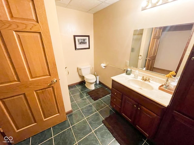 14266 S 125 E, Clinton, IN 47842 - bathroom with vanity, tile patterned flooring, and a paneled ceiling
