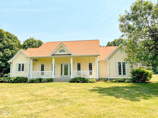 14266 S 125 E, Clinton, IN 47842 - view of front of property with covered porch, a front yard, a shingled roof, and french doors