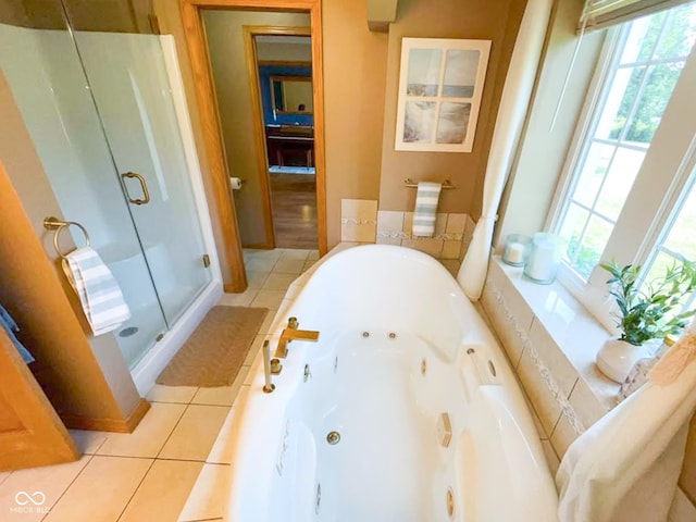 14266 S 125 E, Clinton, IN 47842 - bathroom with a shower stall, a whirlpool tub, healthy amount of natural light, and tile patterned floors