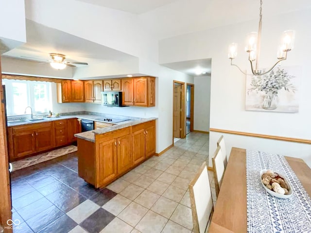 14266 S 125 E, Clinton, IN 47842 - kitchen with black appliances, brown cabinets, a peninsula, light countertops, and a chandelier