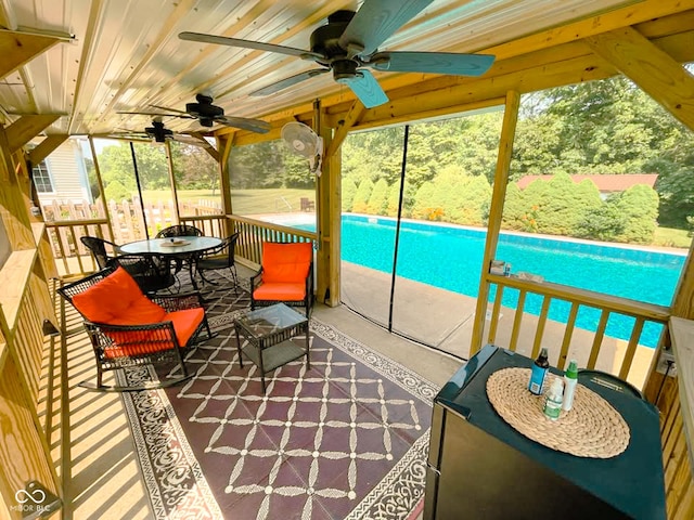 14266 S 125 E, Clinton, IN 47842 - sunroom / solarium featuring ceiling fan, healthy amount of natural light, and outdoor dining space
