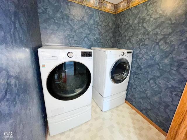 14266 S 125 E, Clinton, IN 47842 - laundry area featuring washing machine and dryer and tile patterned floors