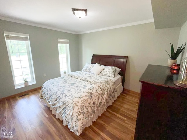 14266 S 125 E, Clinton, IN 47842 - bedroom featuring light wood-style floors and crown molding