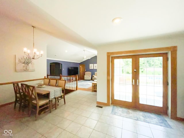 14266 S 125 E, Clinton, IN 47842 - dining room with lofted ceiling, a chandelier, french doors, a ceiling fan, and light tile patterned floors