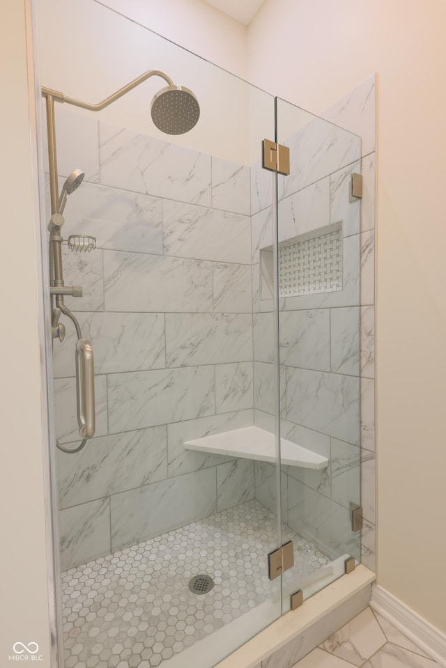 8069 Middle Bay Ln, Indianapolis, IN 46236 - bathroom featuring a stall shower and marble finish flooring