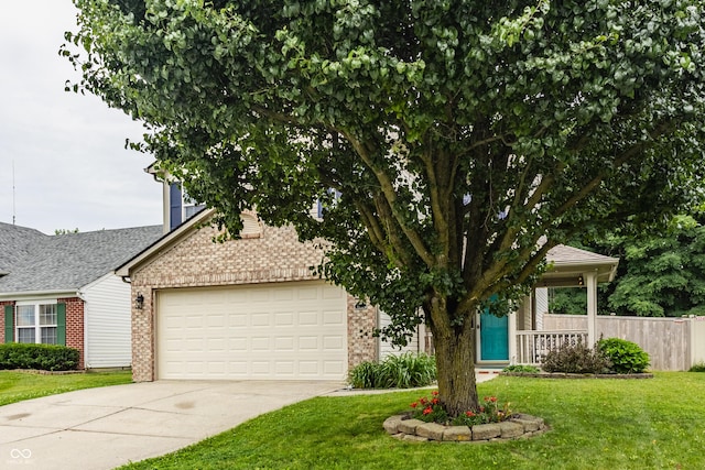 1112 Halifax Ct, Indianapolis, IN 46231 - view of property hidden behind natural elements with a garage, concrete driveway, and brick siding