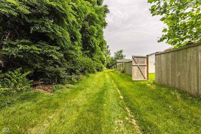 1112 Halifax Ct, Indianapolis, IN 46231 - view of yard featuring an outbuilding