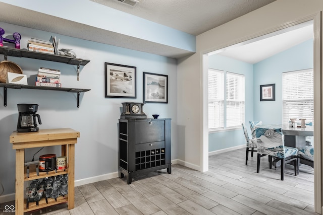 1112 Halifax Ct, Indianapolis, IN 46231 - office area with light wood-style floors and baseboards