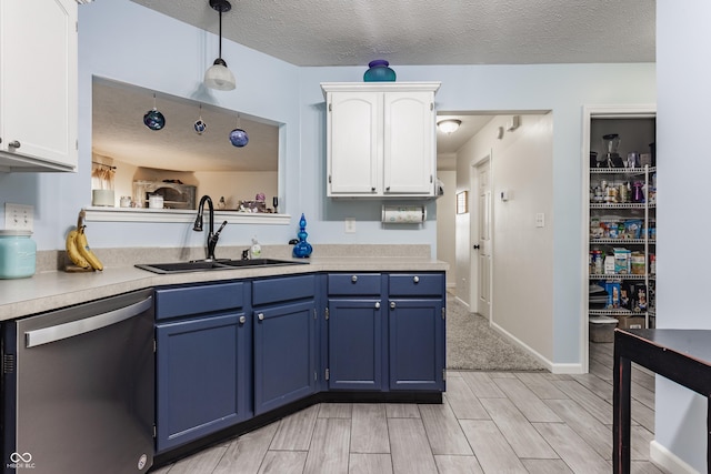 1112 Halifax Ct, Indianapolis, IN 46231 - kitchen featuring dishwasher, blue cabinets, white cabinetry, light countertops, and wood tiled floors