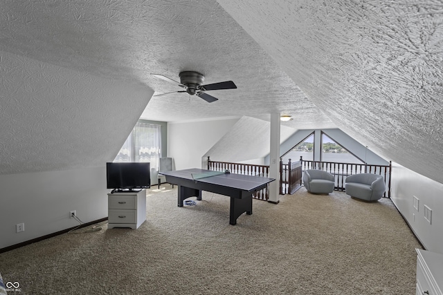 5823 E Sheridan Rd, Monticello, IN 47960 - game room featuring a ceiling fan, a textured ceiling, vaulted ceiling, and carpet flooring