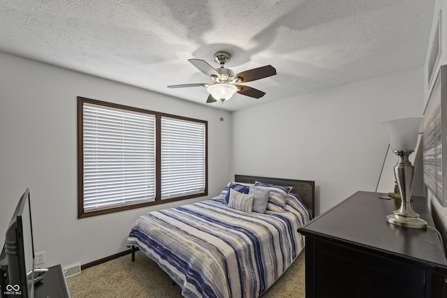 5823 E Sheridan Rd, Monticello, IN 47960 - bedroom featuring carpet floors, a ceiling fan, and a textured ceiling