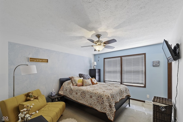 5823 E Sheridan Rd, Monticello, IN 47960 - bedroom featuring light carpet, a ceiling fan, and a textured ceiling